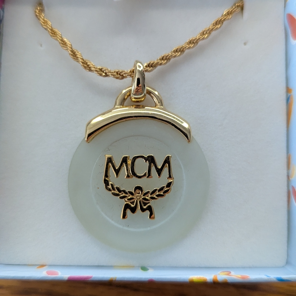 MCM Floral Necklace in Box with Yellow Ribbon